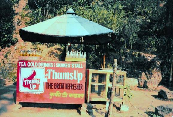 https://upload.wikimedia.org/wikipedia/commons/8/89/Thums_Up._The_Great_Refresher._Roadside_Stall._Himachel_Pradesh%2C_India._2011.jpg